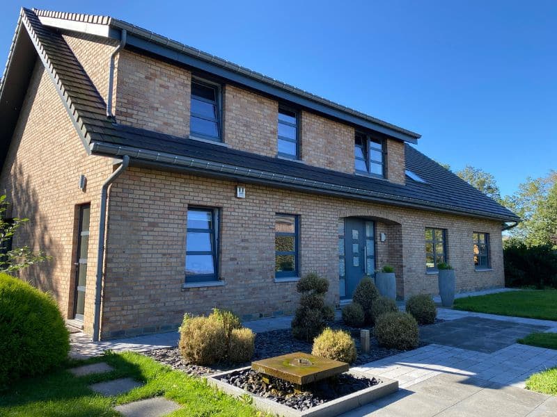 fenetre porte alu maison brique